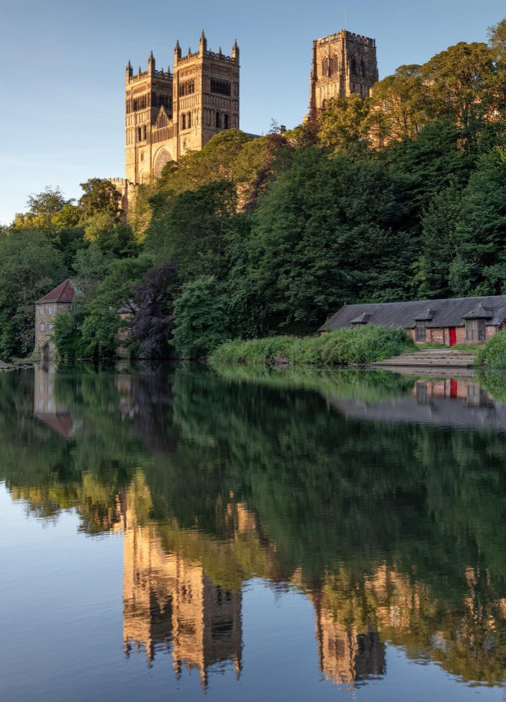 Ecommerce websites - durham Cathedral reflected in the still water of the River Wear