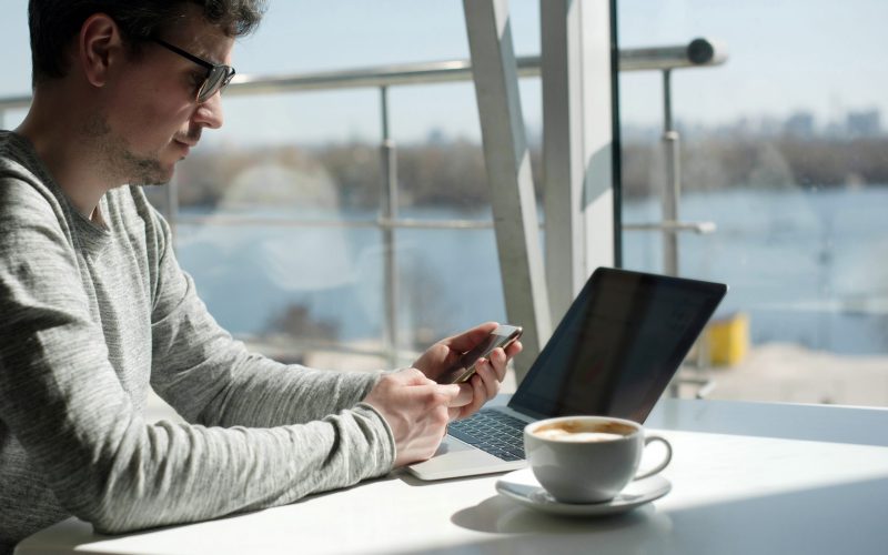 midsection-man-sitting-table